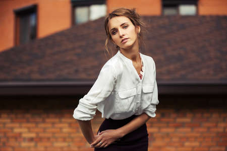 Young fashion business woman on the city streetの写真素材