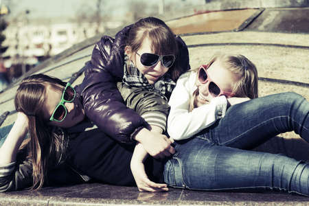 Group of happy teen girls outdoorの写真素材