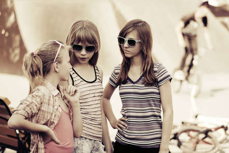 Group of teen girls on the playgroundの写真素材