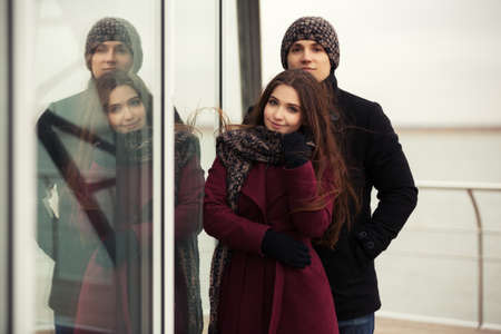 Happy young couple in love walking outdoorの写真素材