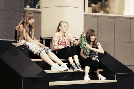 Group of teen girls on the stepsの写真素材
