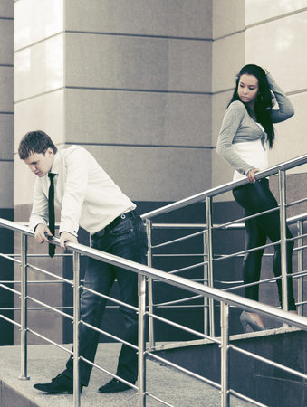 Young man and woman in conflict