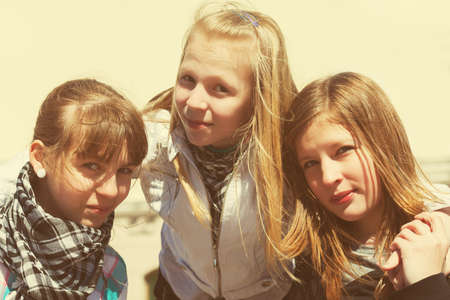 Group of happy teen girlsbon city streetの写真素材