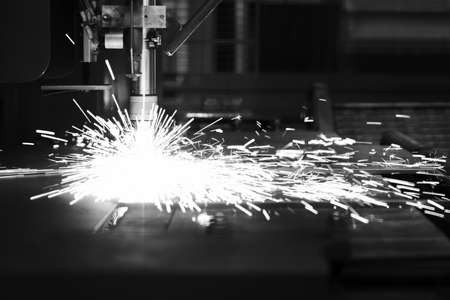 Industrial cnc plasma machine cutting of metal plate and profileの写真素材
