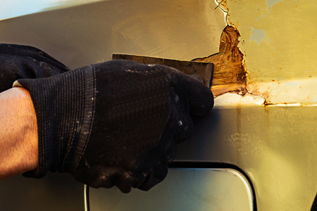technical remove rust and repair paint on car bodyの写真素材