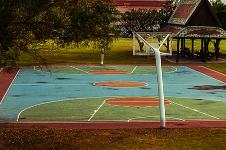 outdoor basketball court in the park  with trees  backgroundの写真素材