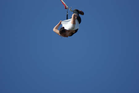The Bungee, super woman, in time of flight の写真素材