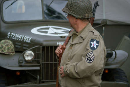 The soldier of USA on background of lorry のeditorial素材