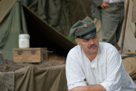 Poland soldier before tent  In cap 