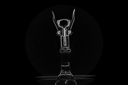 Corkscrew wine opener  On a black background 
