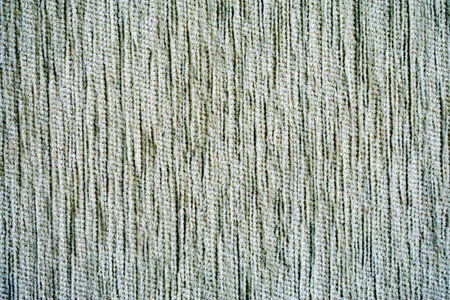 Texture of woven material from large yarns for upholstery upholstery of beige color