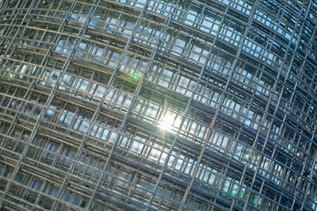 metal mesh twisted into a roll, close-up, as a background and abstractionの写真素材