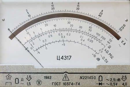 arrow and measuring scales of the old Soviet ammeter with icons and other markingsの写真素材