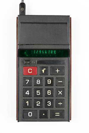 old Soviet calculator with luminous green LEDs numbers on a white backgroundの写真素材