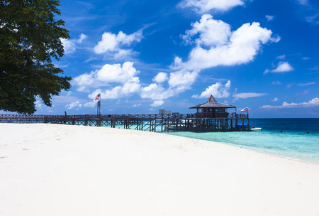 Main pier and white sand beach on Pulau Sipadan island near Borneo, Malaysiaの写真素材