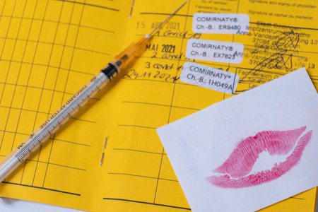 European vaccination card with injection and kiss mouth