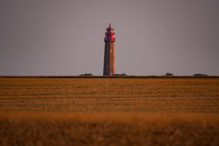 Fluegger lighthouse at sunset, Fehmarn Island in Germanyの写真素材