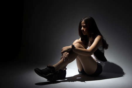 lonely asian teenagerの写真素材