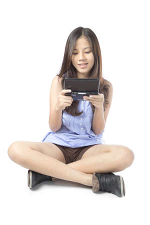 model playing game in white backgroundの写真素材