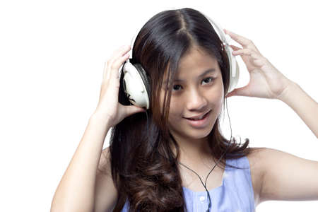 a model enjoying musicの写真素材