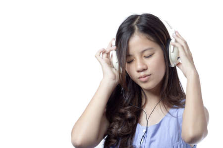 a model enjoying musicの写真素材