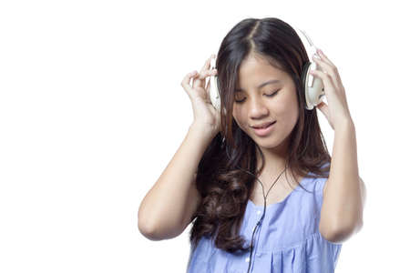 a model enjoying musicの写真素材