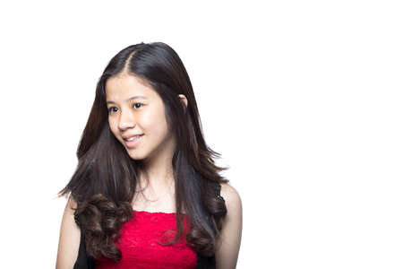 asian teen with red dressの写真素材