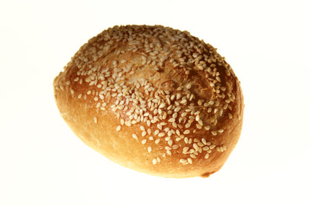 sesame seed roll on white backgroundの写真素材