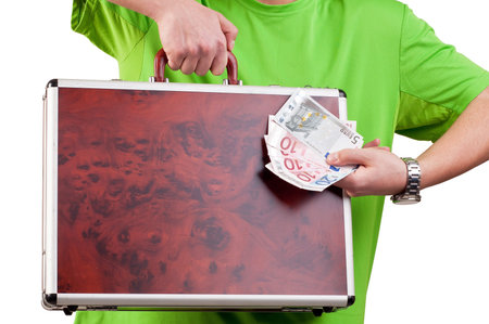 man holding and showing a briefcase and money