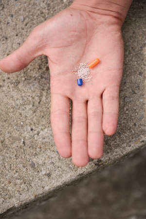 Hand with a unfolded pillの写真素材