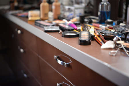Make-up tools on a wooden tableの写真素材