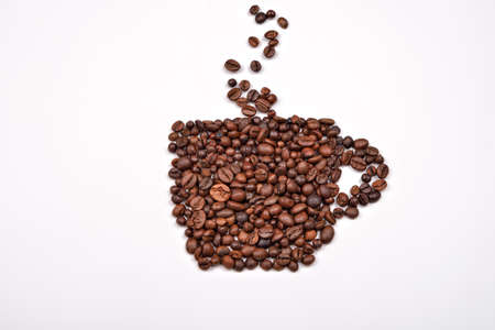 Coffee cup image made up of coffee beans on a white backgroundの写真素材