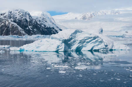 Beautiful iceberg drifting in Antarctic watersの写真素材