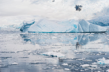 Beautiful iceberg drifting in Antarctic watersの写真素材