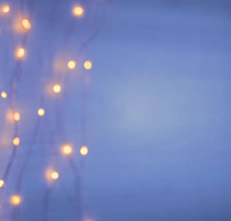 Christmas lights on background with copy space. Decorative garlandの写真素材