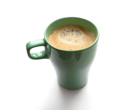 Soft focus green mug of coffee isolated on a white backgroundの写真素材