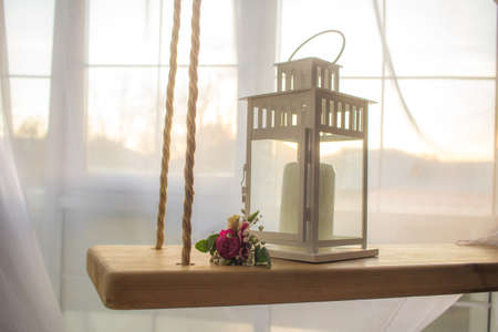 Lamp and flower on swing wedding backgroundの写真素材
