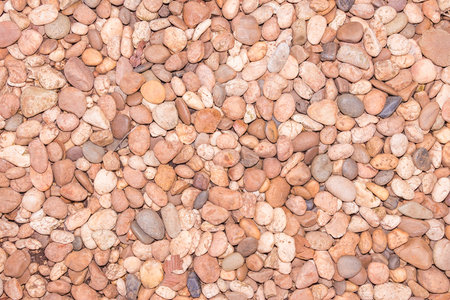Texture of the natural brown stone for background