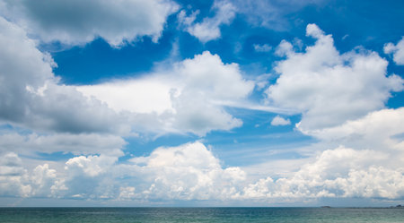 Beautiful white fluffy cloud on blue sky over the sea.の写真素材