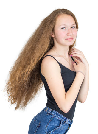 girl with magnificent hair on white backgroundの写真素材