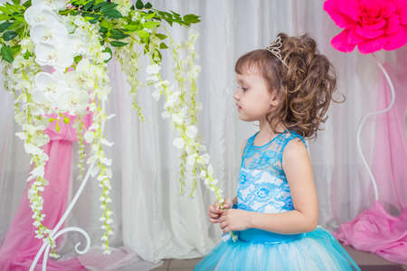 Little girl in blue dressの写真素材