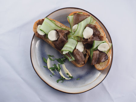 Juicy beef, tender cheese, fresh cucumber and all this on a crispy slice of ciabatta