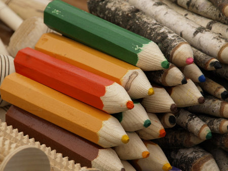 Wooden colored pencils in a box, closeup of photoの写真素材