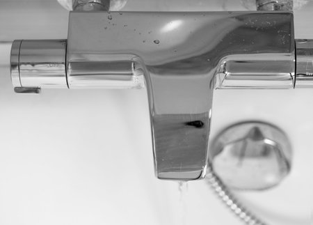 Close-up of a faucet on a white background.の写真素材