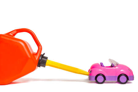 Refueling toy car with plastic gas tankの写真素材