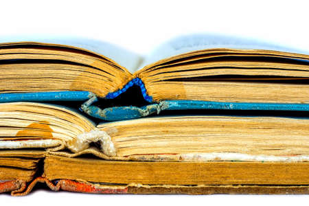 Closeup of three old opened books spineの写真素材