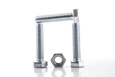 Screws and nut isolated on white