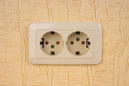 European double power socket in wallの写真素材