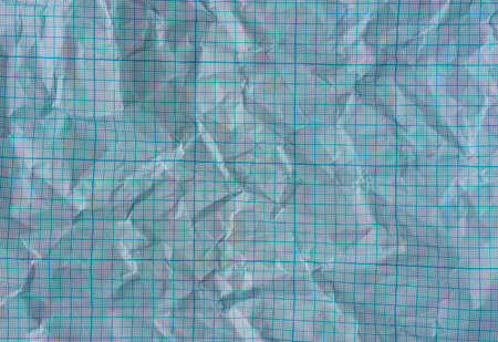 Blue wrinkled graph paper backgroundの写真素材