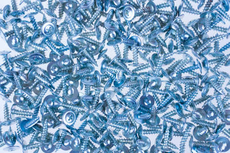 Screws background under blue lightの写真素材